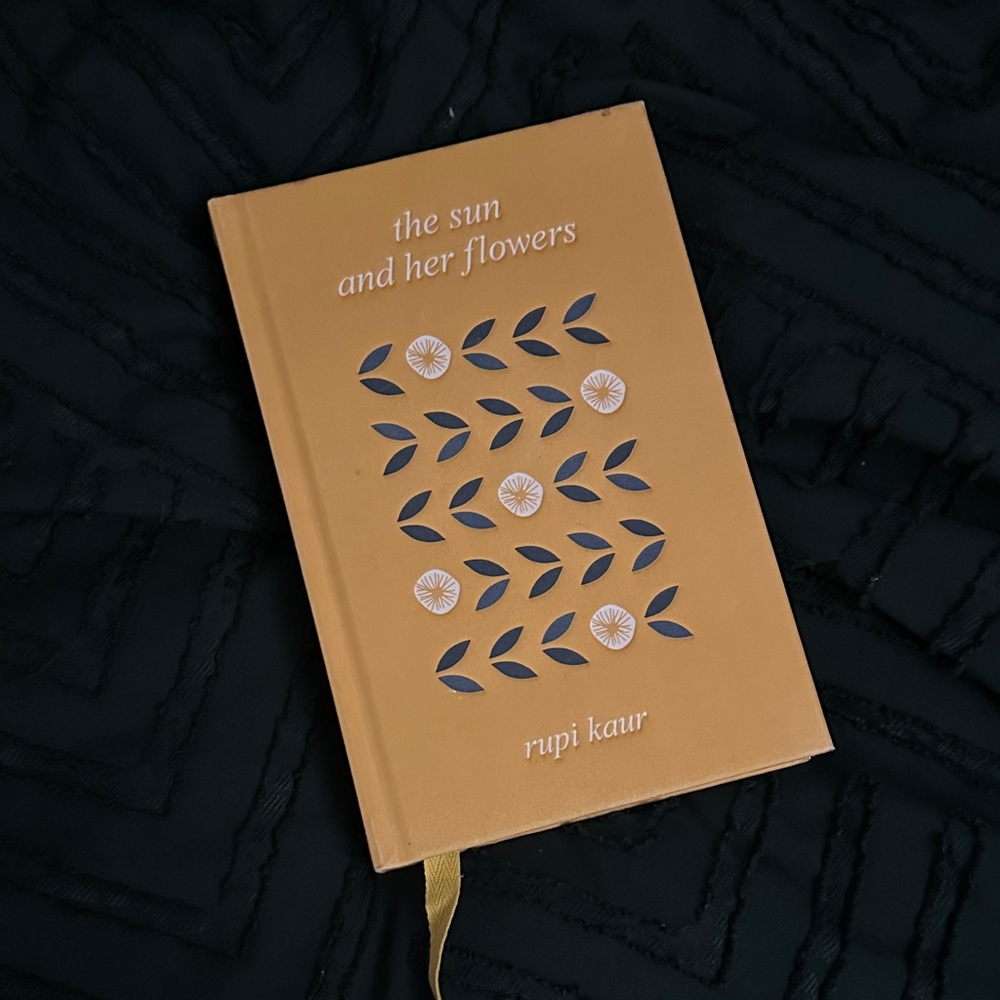 The Sun and Her Flowers Book